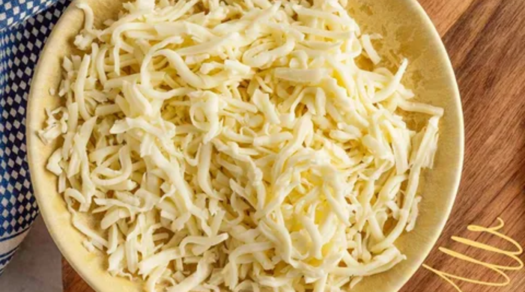 ½ Cup of Shredded Cheese Measuring About 2 Ounces by Weight